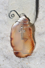 Agate slice ornament with silver cross charm