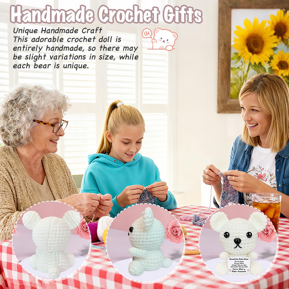 Small knitted white polar bear plush on desk