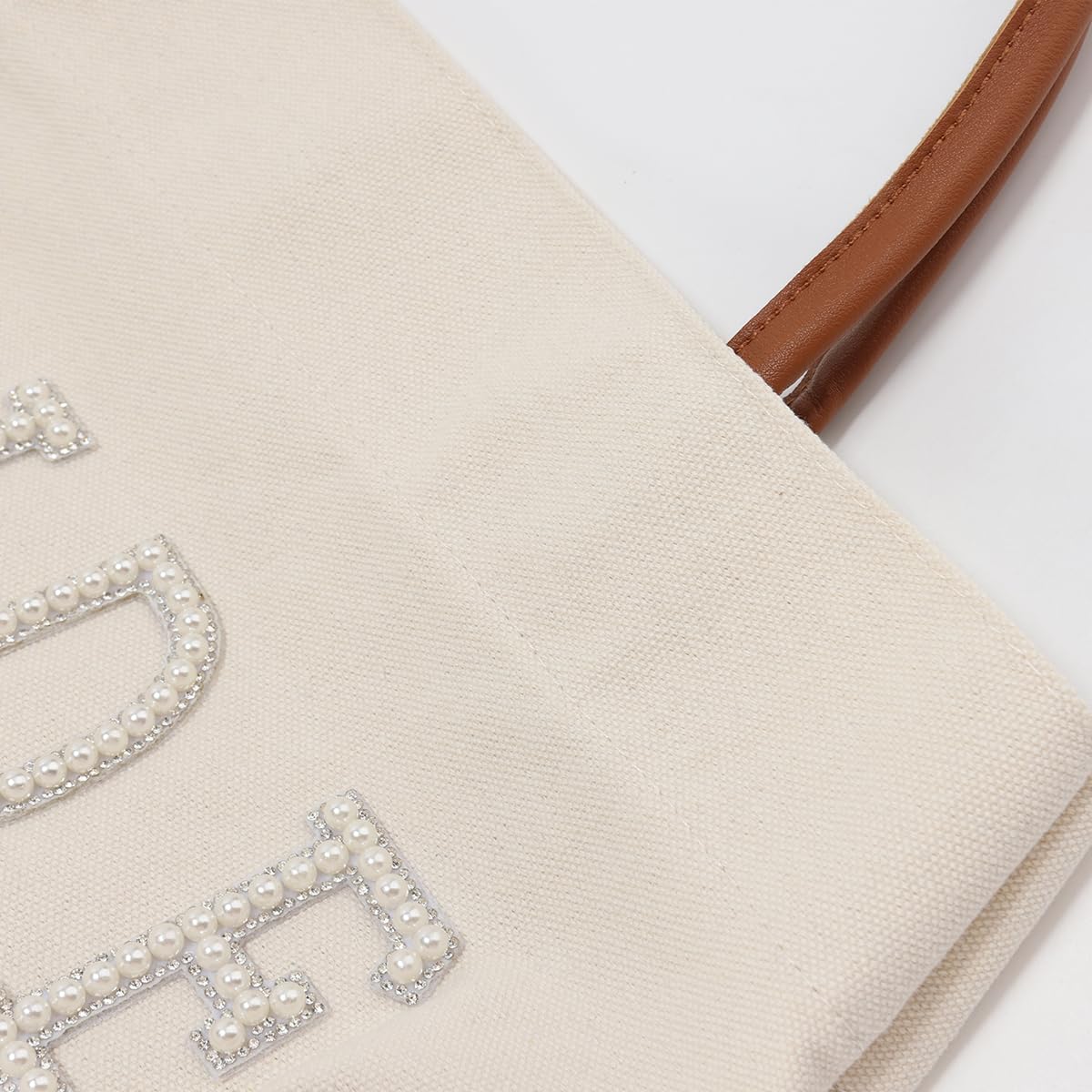 Dimensions 15.4 L x 7.11 H x 11 W of AINMEGE Bride Tote Bag