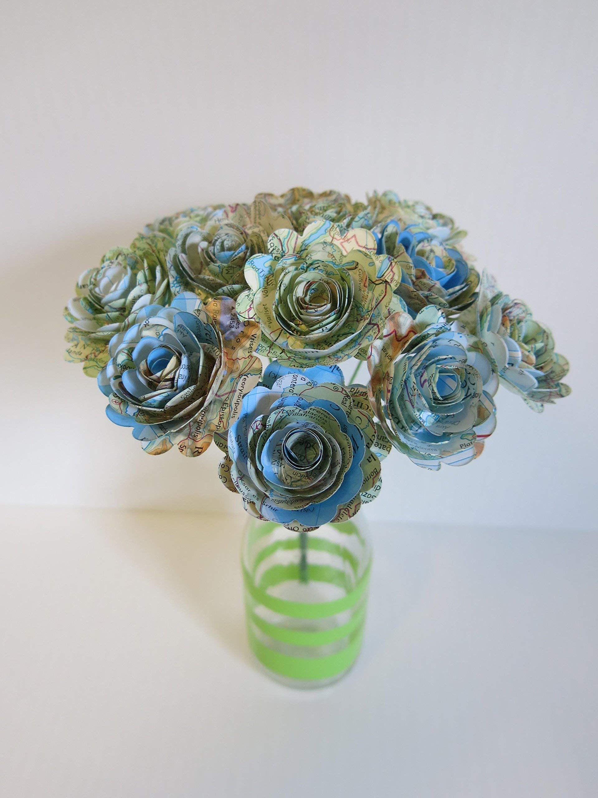 Scalloped edges on quilled paper roses made from atlas pages