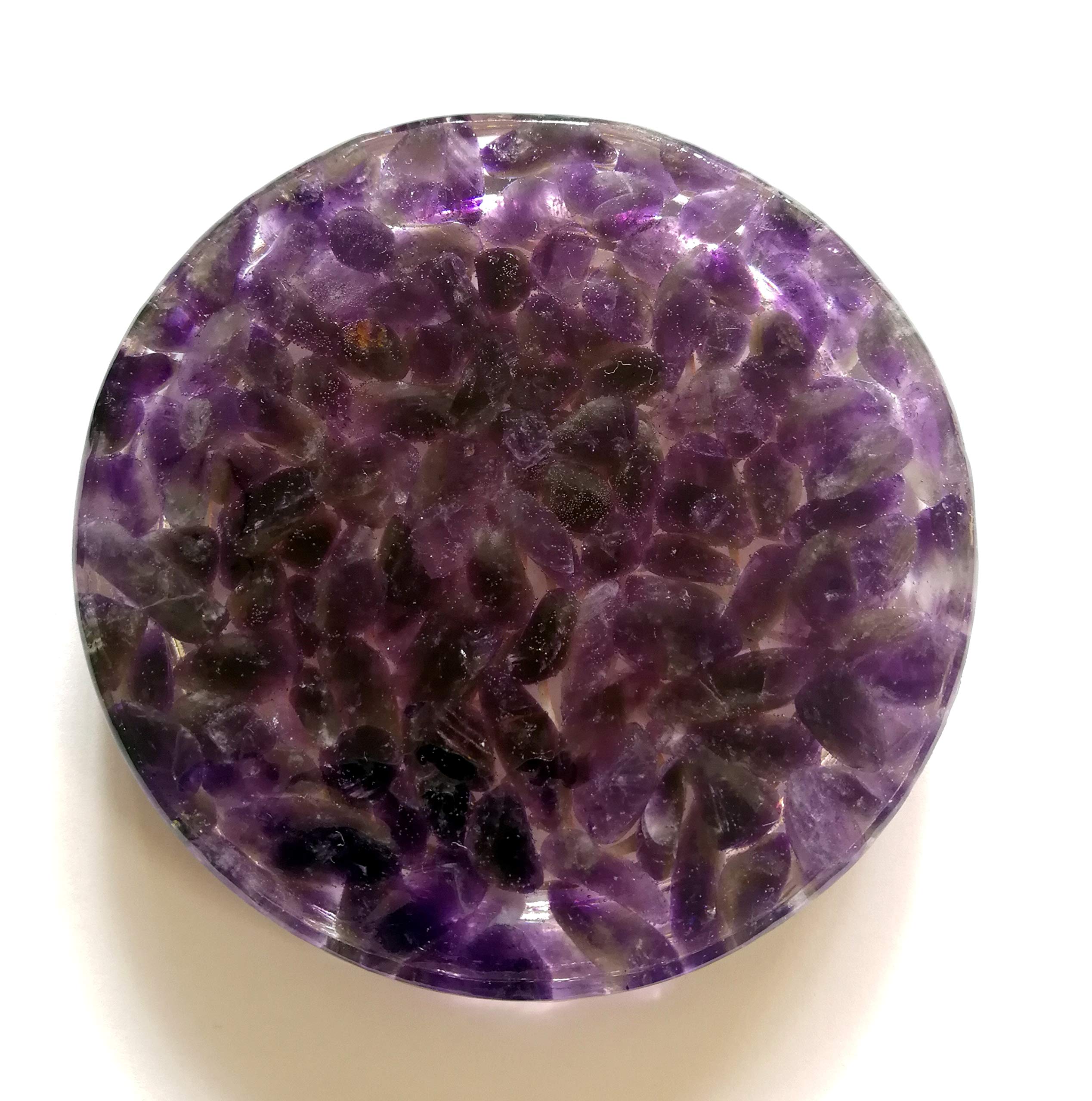 Amethyst crystals with flower of life symbol on metal base