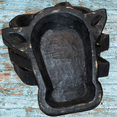 Natural wood dough bowl with cow head motif