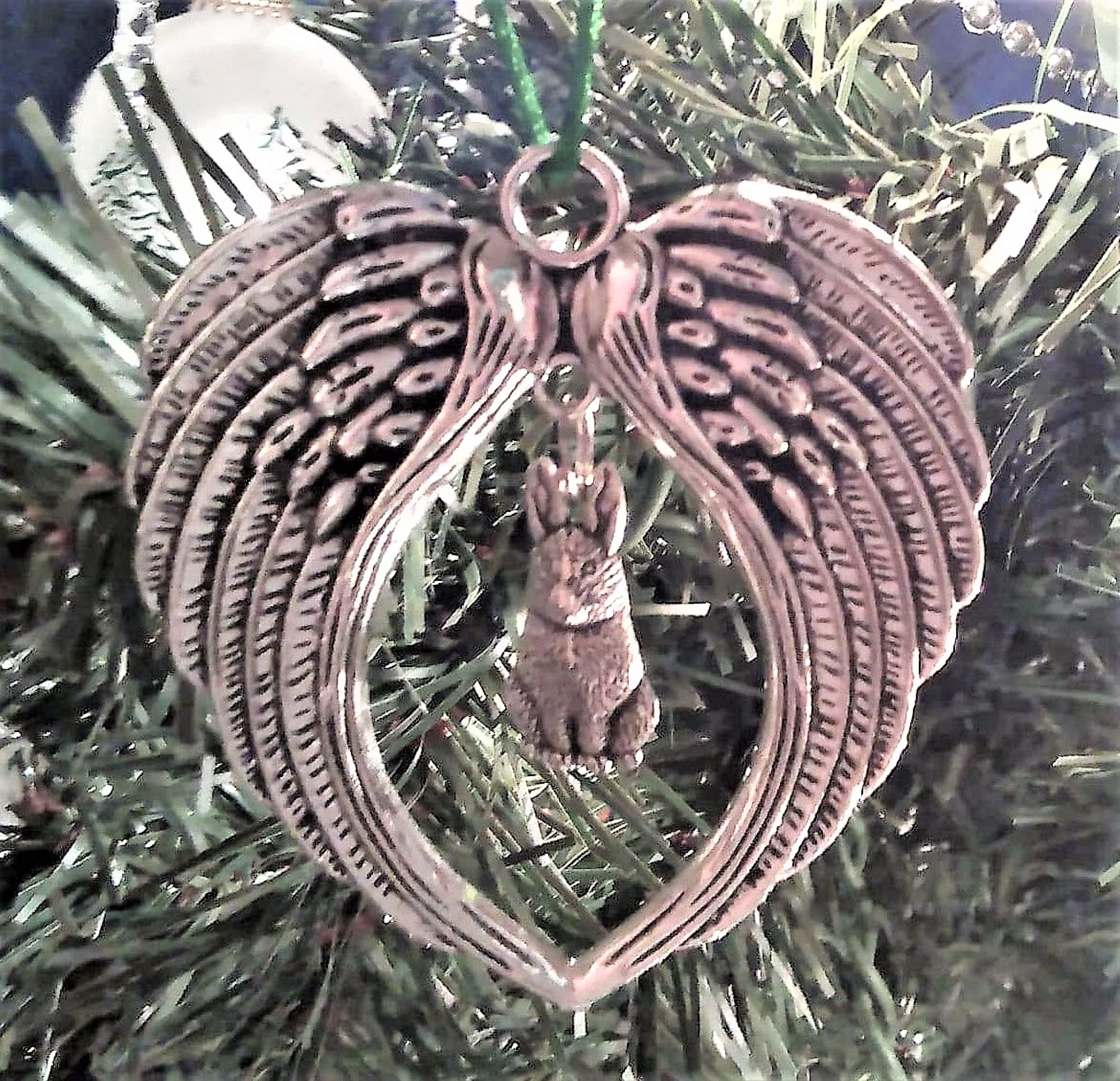 Antiqued silvertone bunny rabbit charm between angel wings