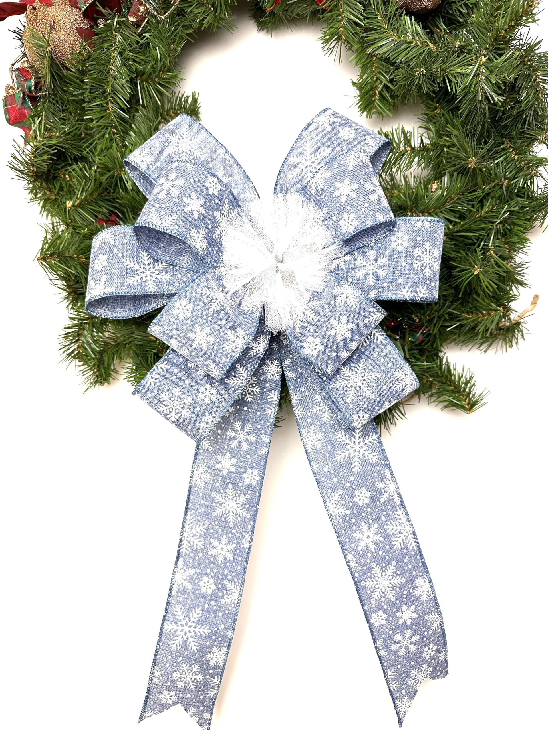 Bow packaged in a box with stays protecting loops