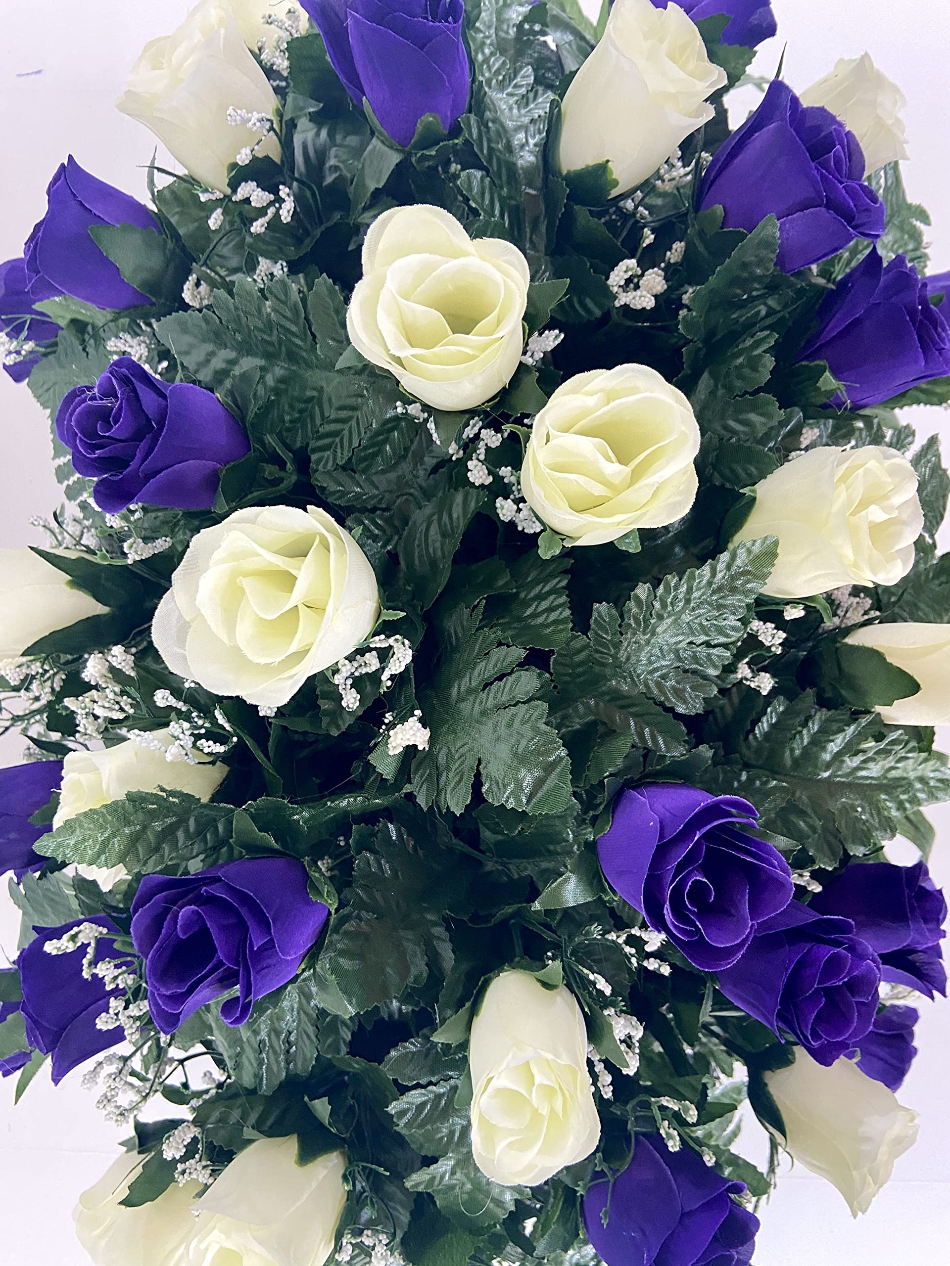 Artificial purple and cream roses with realistic-looking blooms and foliage