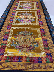 Yellow Nepal handmade table runner with wheel of life border and oriental design