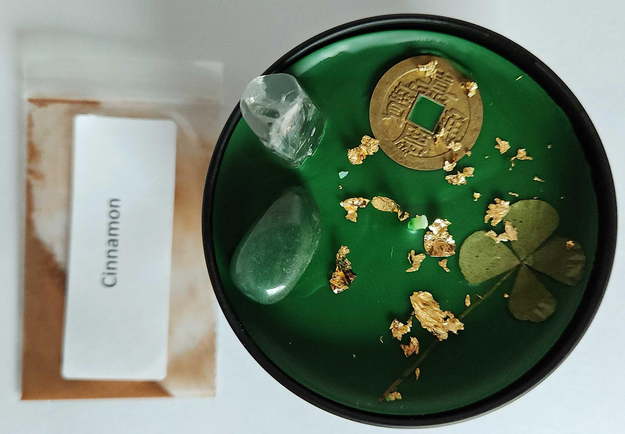 Handmade prosperity ritual candle being prepared