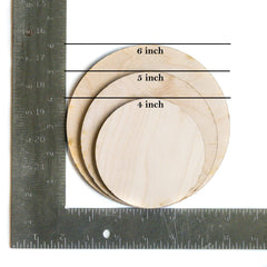 Back side of newborn announcement sign with birth stat lines on birch plywood