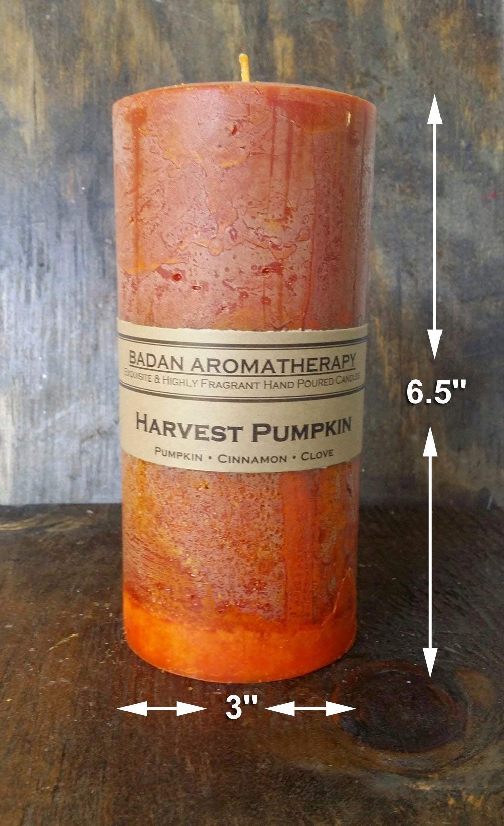 Dark orange pillar candle by Badan for fall decor