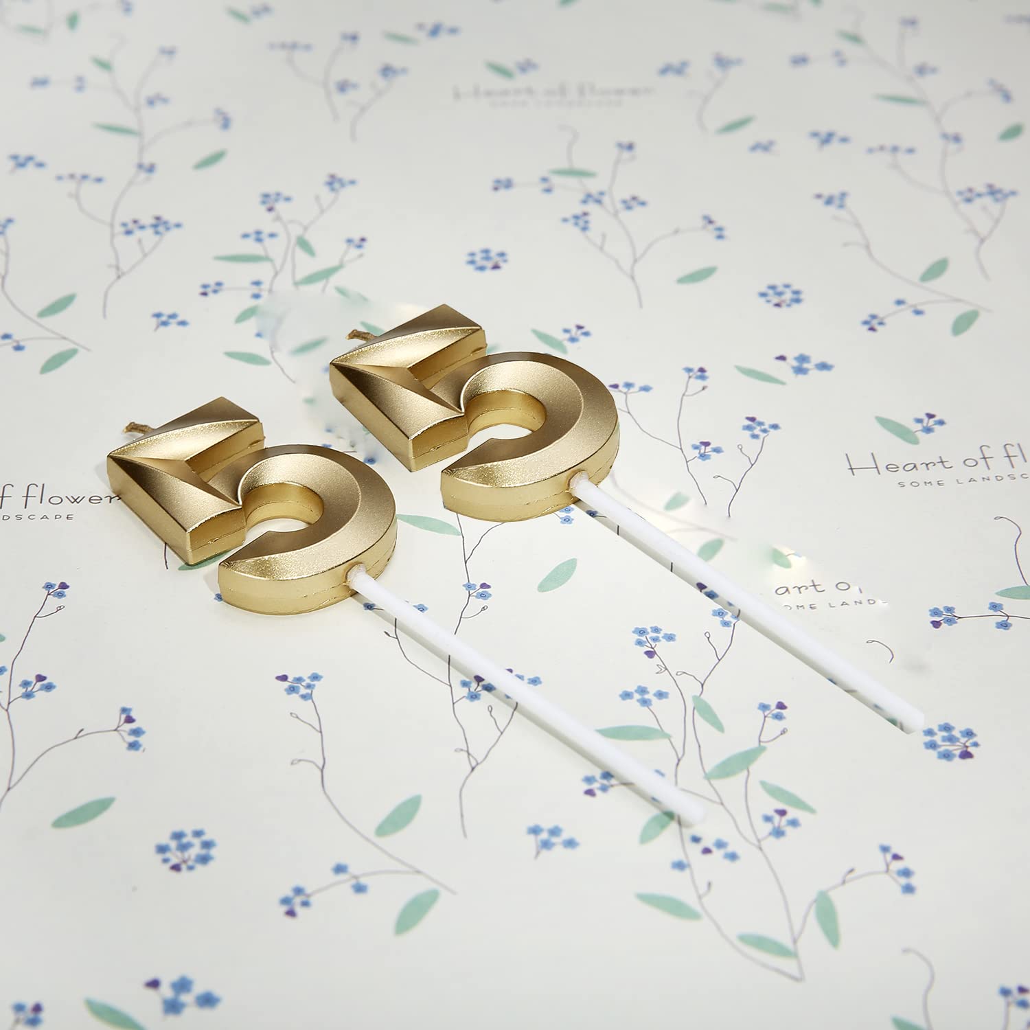 Gold number 55 cake topper candle Bailym close view