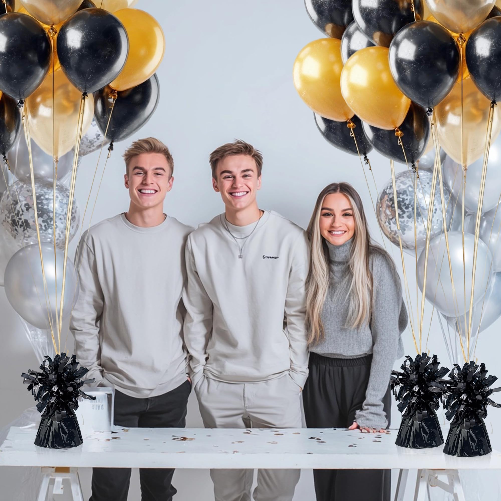 Black balloon weights used for table centerpiece decorations