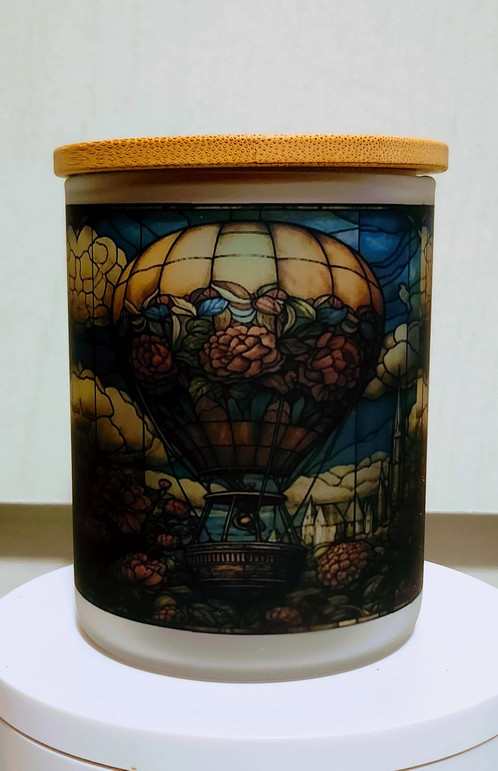 Tea light holder with bamboo lid shown in design jar