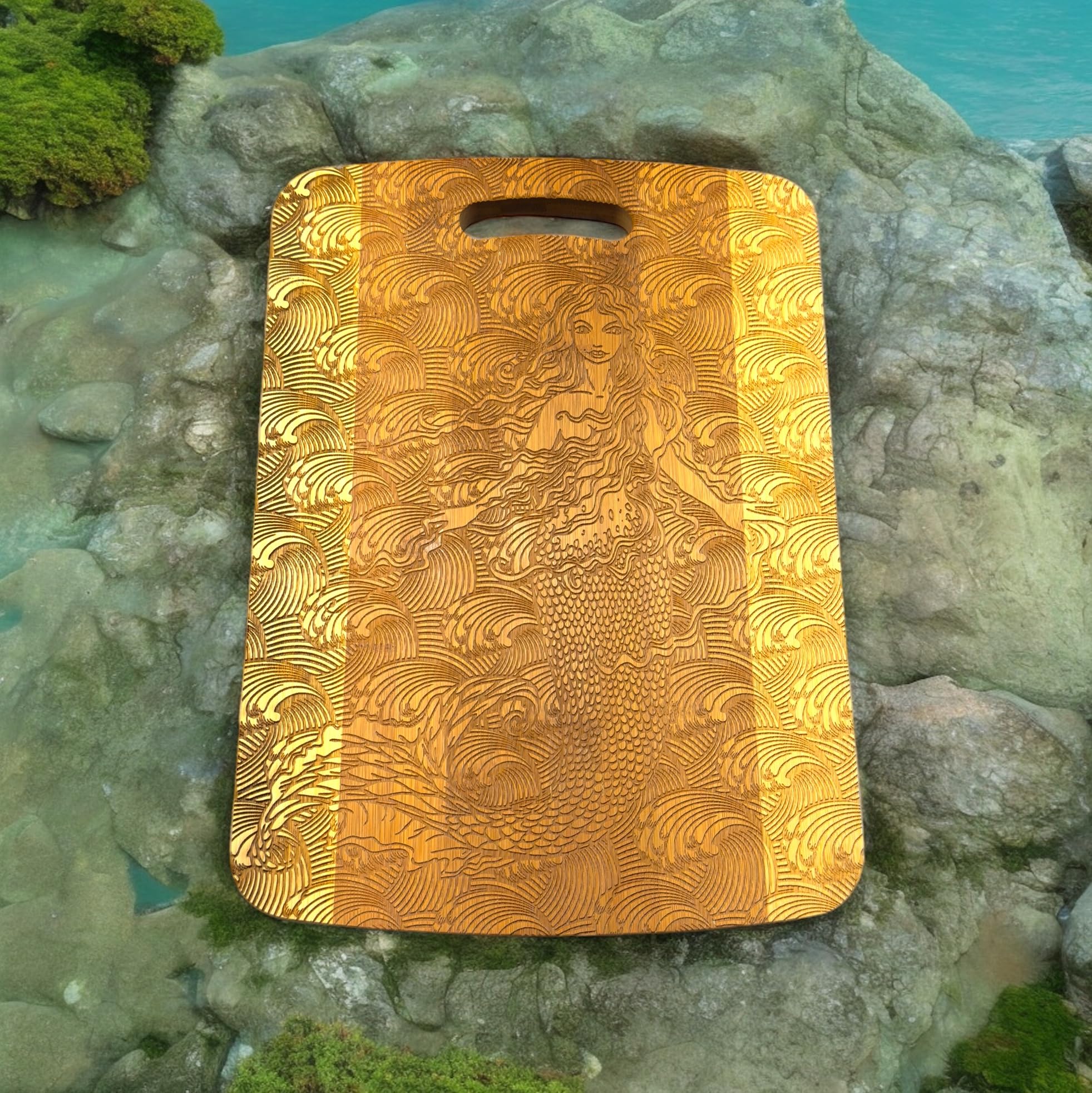 Hanging carrying handle feature on Mermaid Cutting Board
