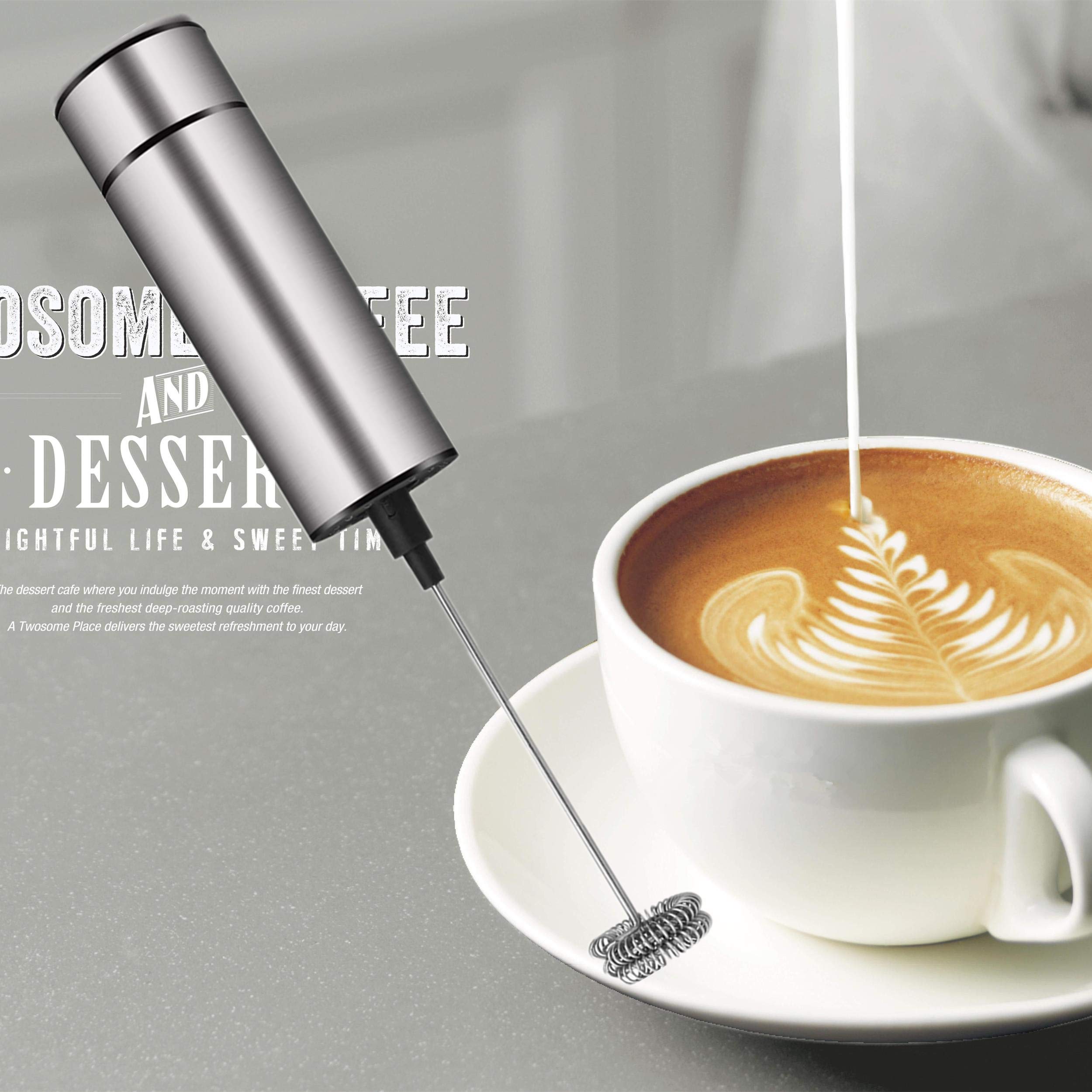 Close up of double steel whisk inside frother