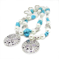 Beach themed drapery hold backs with silver chain