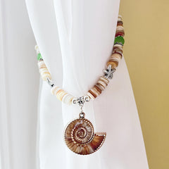 Beaded drapery tieback for coastal decor