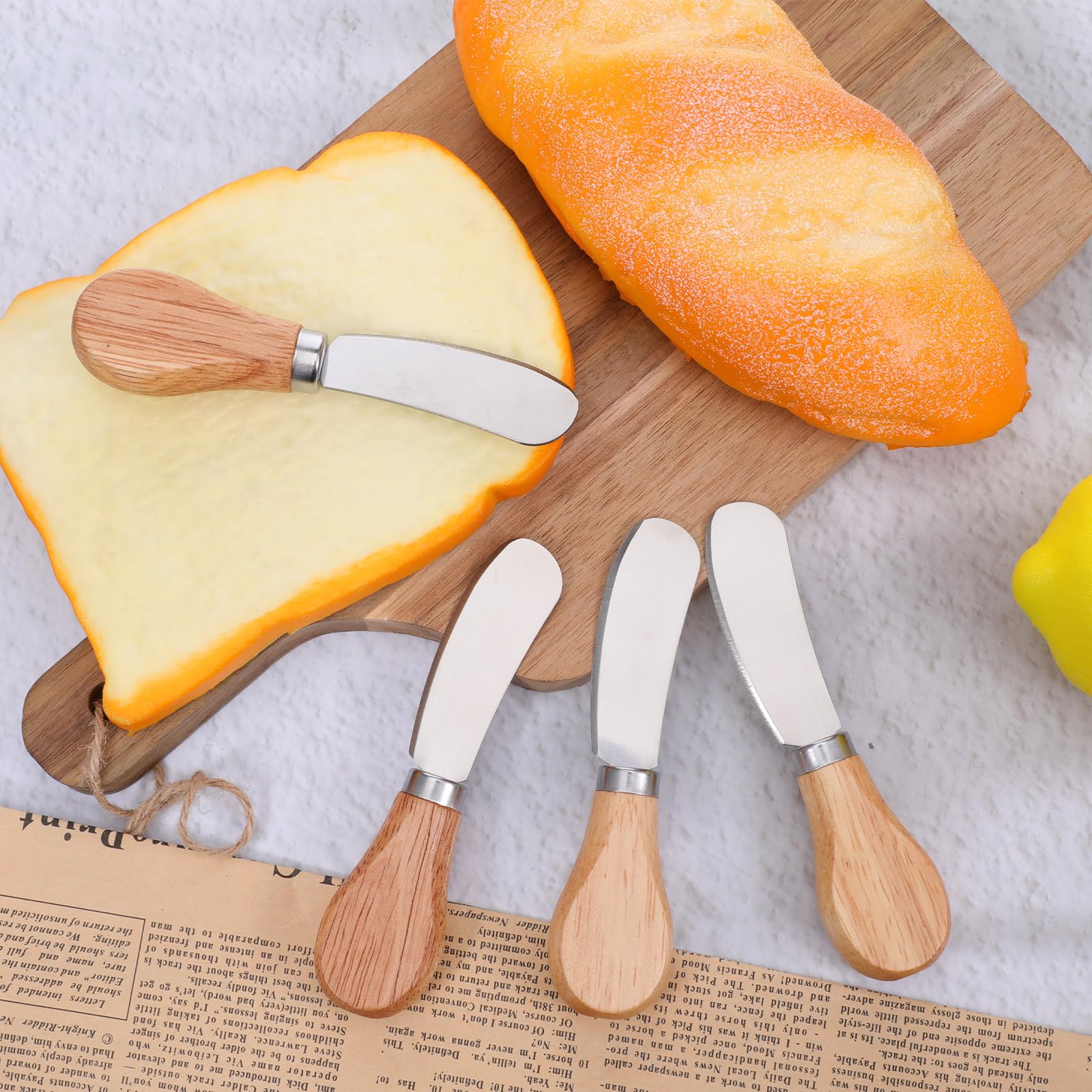 Pack of four cheese spreaders for butter jam and cheese in kitchen setting