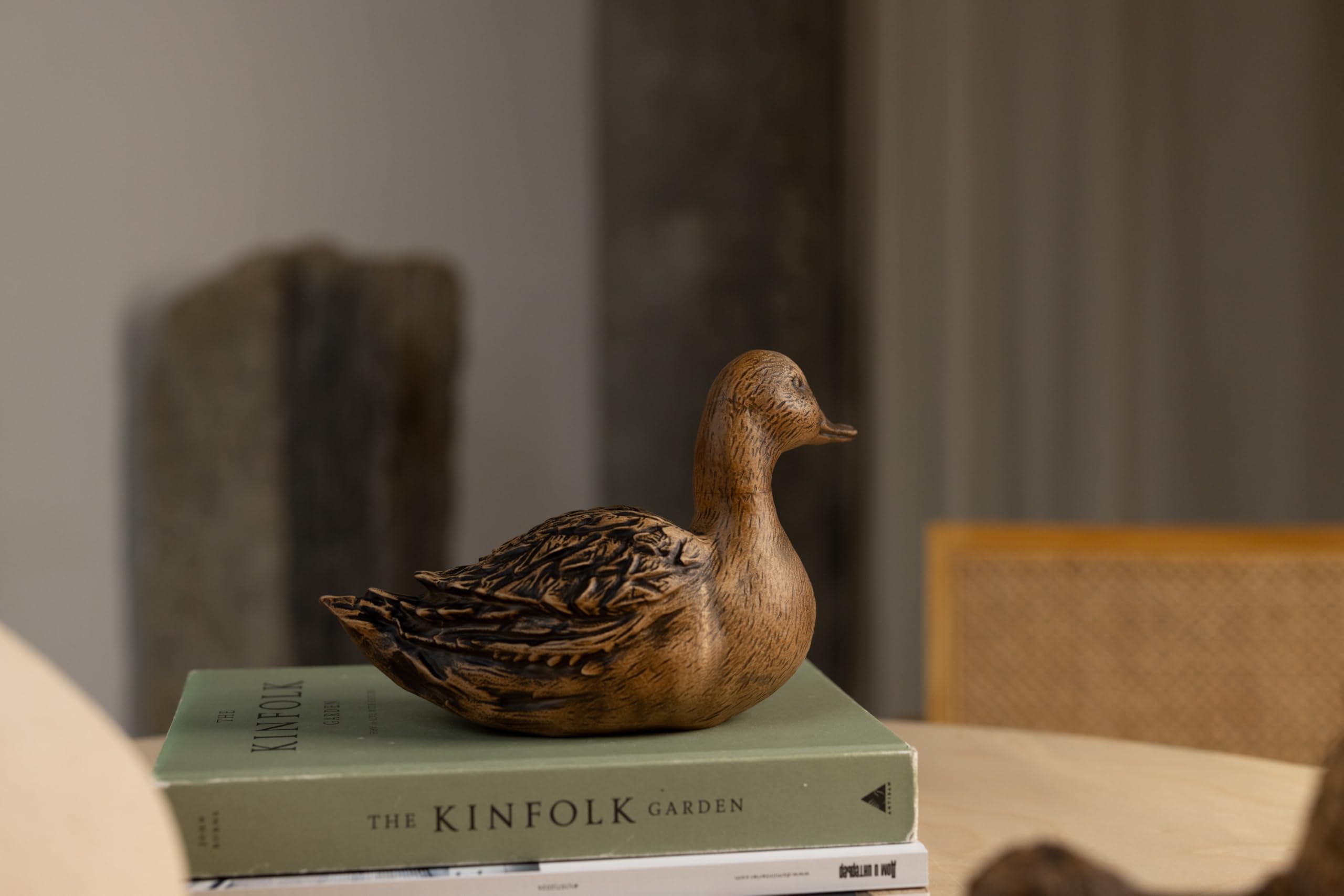 Hand-carved beech wood duck figurine with natural grain