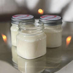 Natural wax blend soy candle in glass mason jar