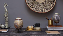 Ostrich egg on wooden base or brass display stand