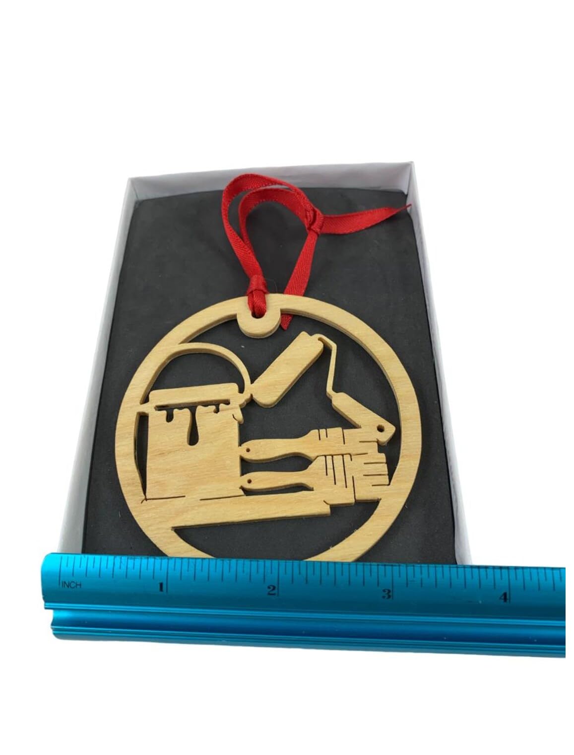 Gift box packaging for painter Christmas ornament ready to give