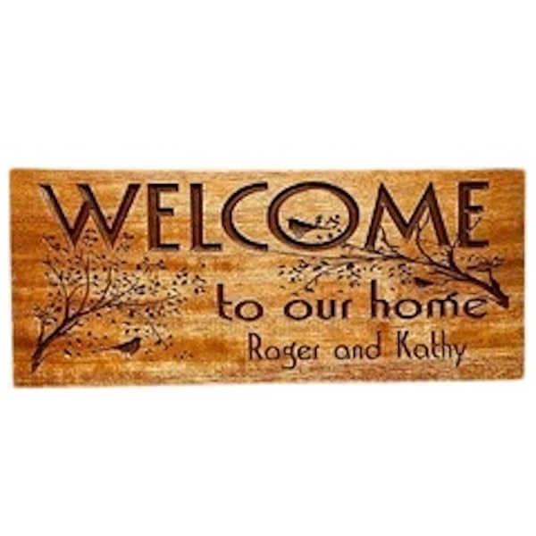 Bird and tree branch design on sign