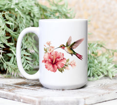 Durable ceramic mug featuring hummingbird and floral motif
