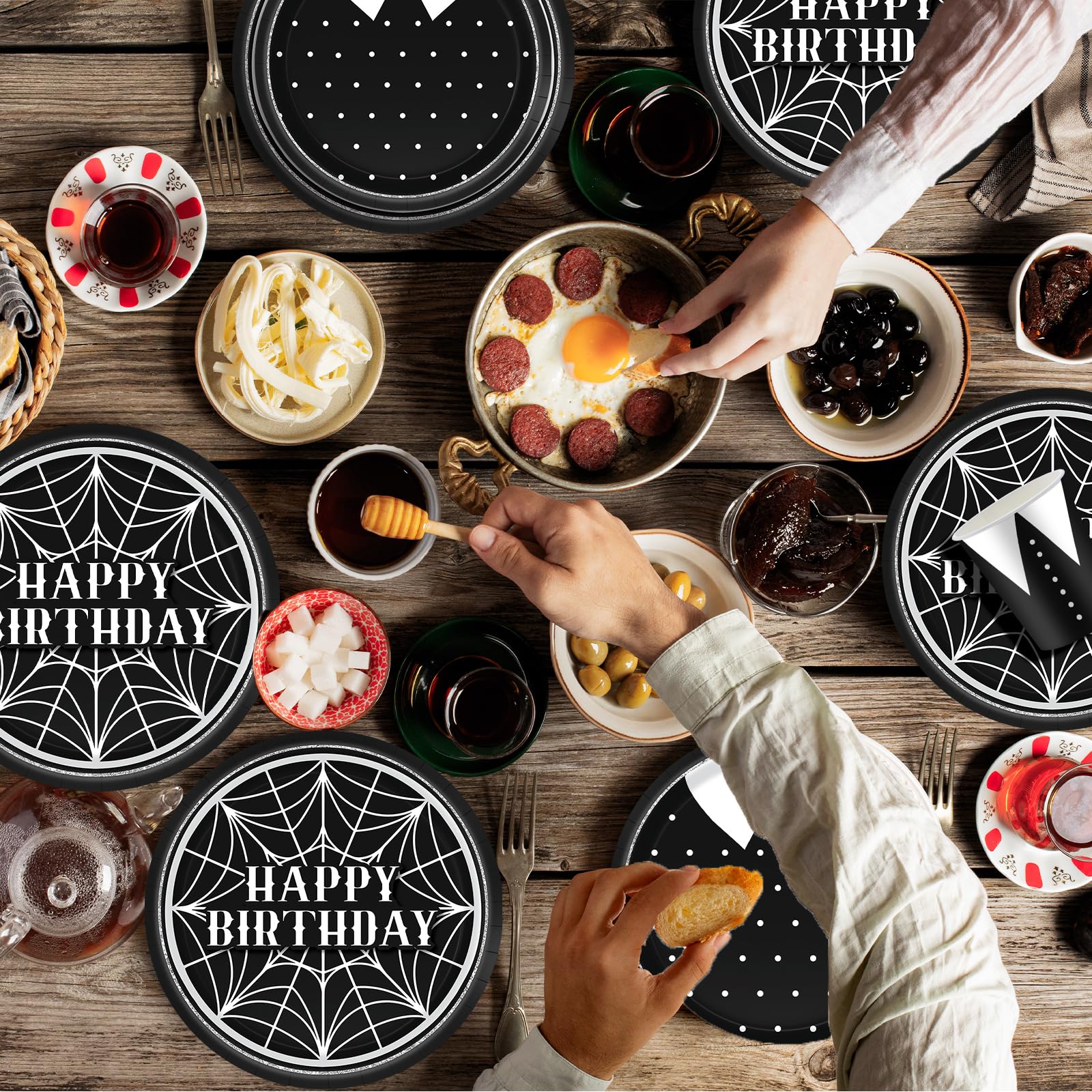 Web pattern and silhouette motif in gothic party decorations