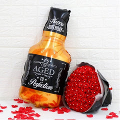 Birthday party whiskey balloon decoration in aluminum foil