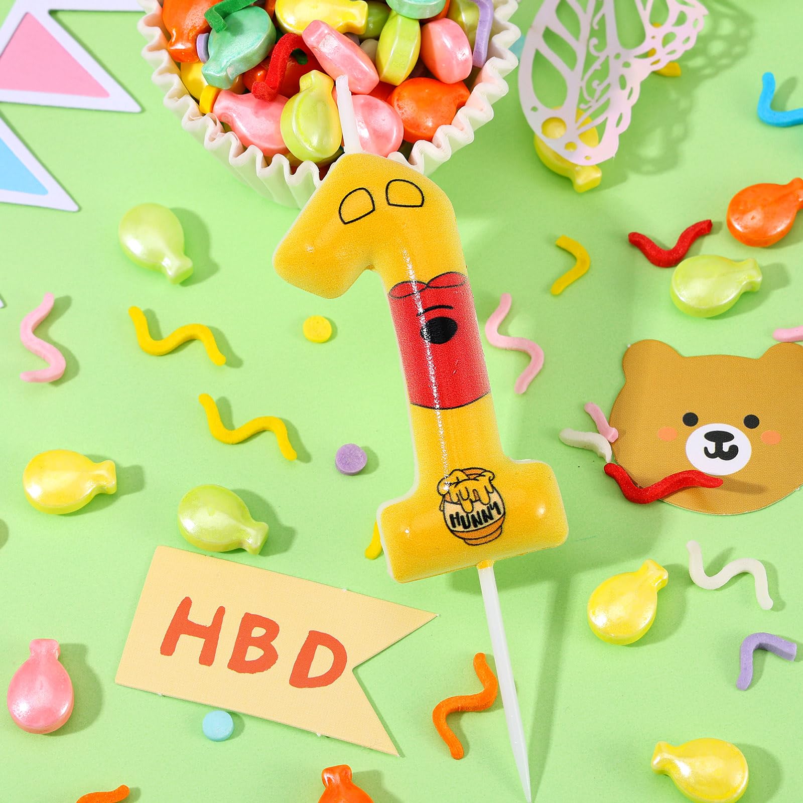 Bright yellow bear candle for kids birthday celebrations