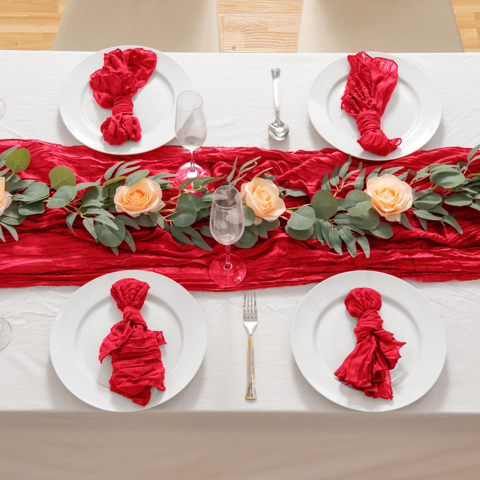 Bridal shower decor with red cheesecloth table runner