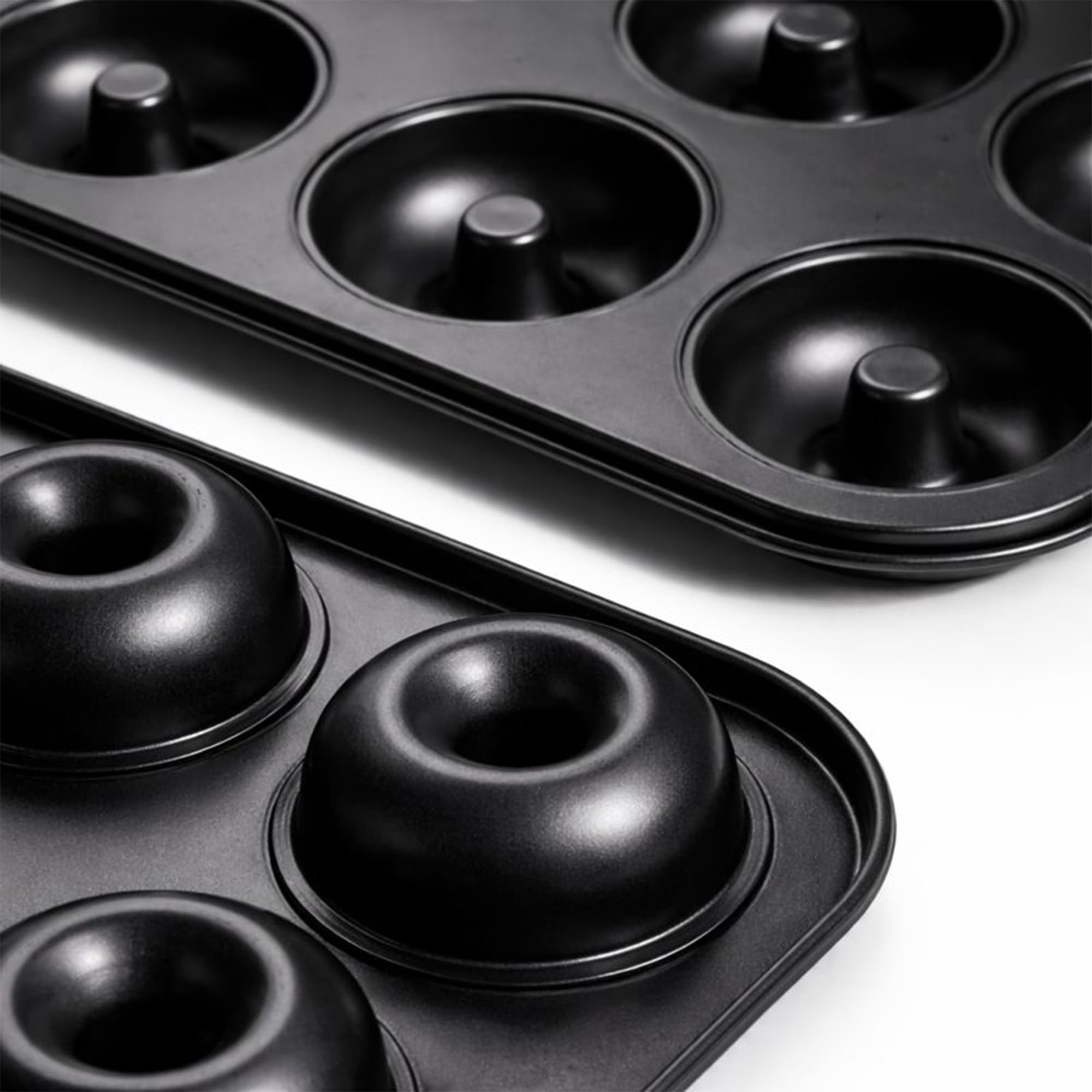 Gray carbon steel donut pan stackable and easy to clean