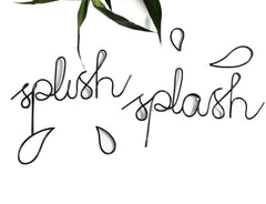 Black Metal Splish Splash Wall Art two-word sign for bathroom decor