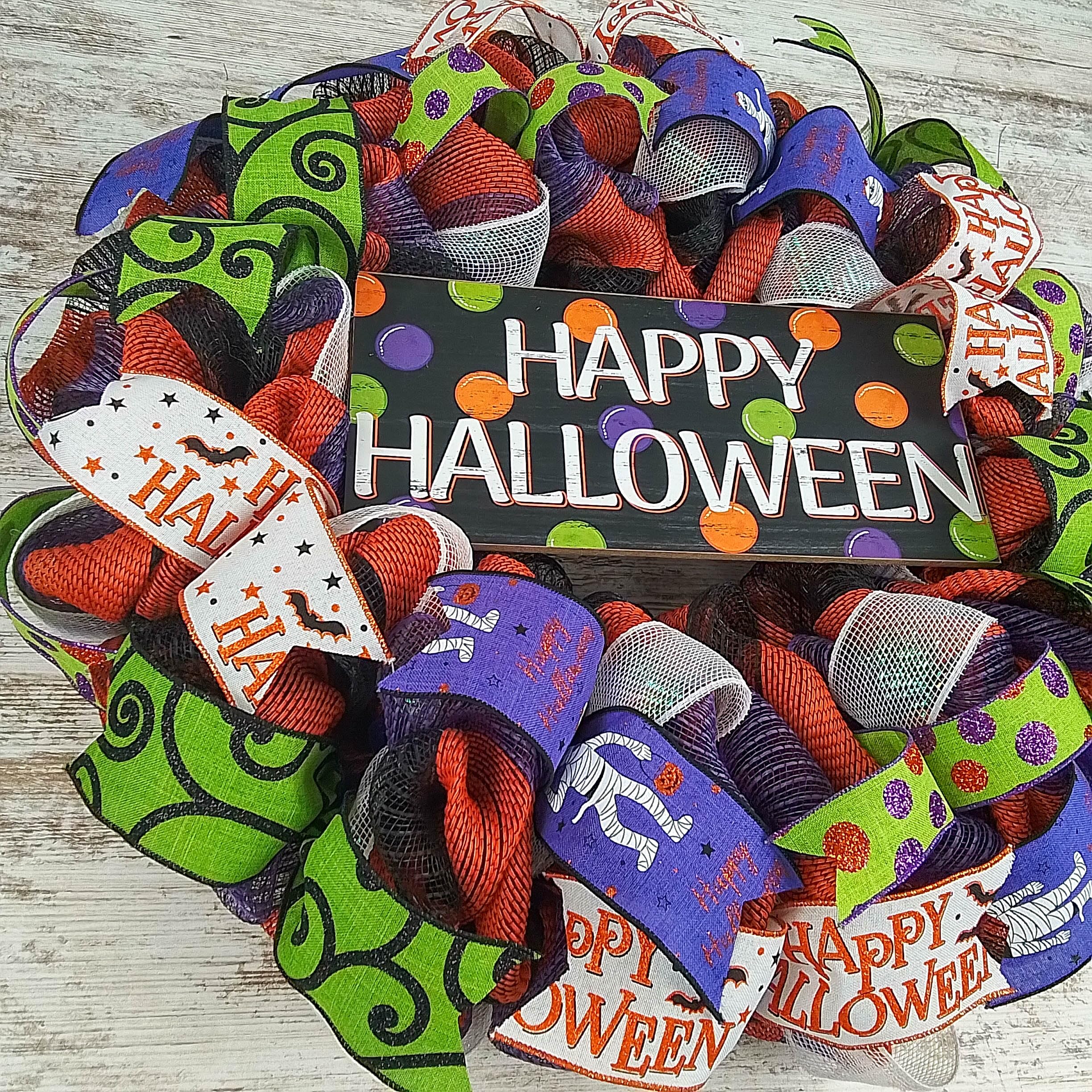Black orange purple lime green Halloween wreath with ribbons
