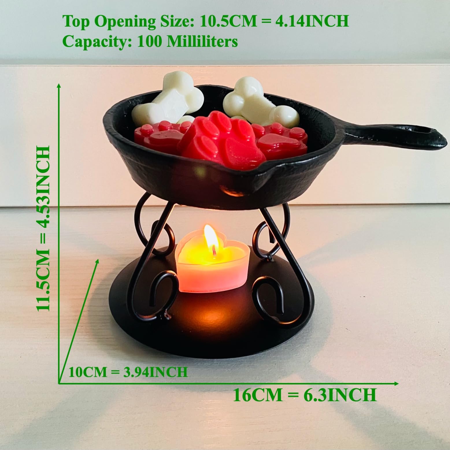 Tea light candle heats the wax melter