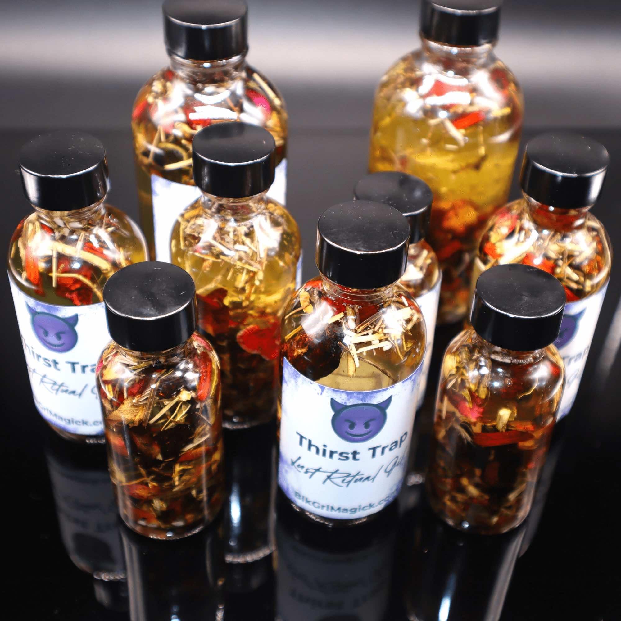 BlkGrlMagick hoodoo oil with red sandalwood and rose petals
