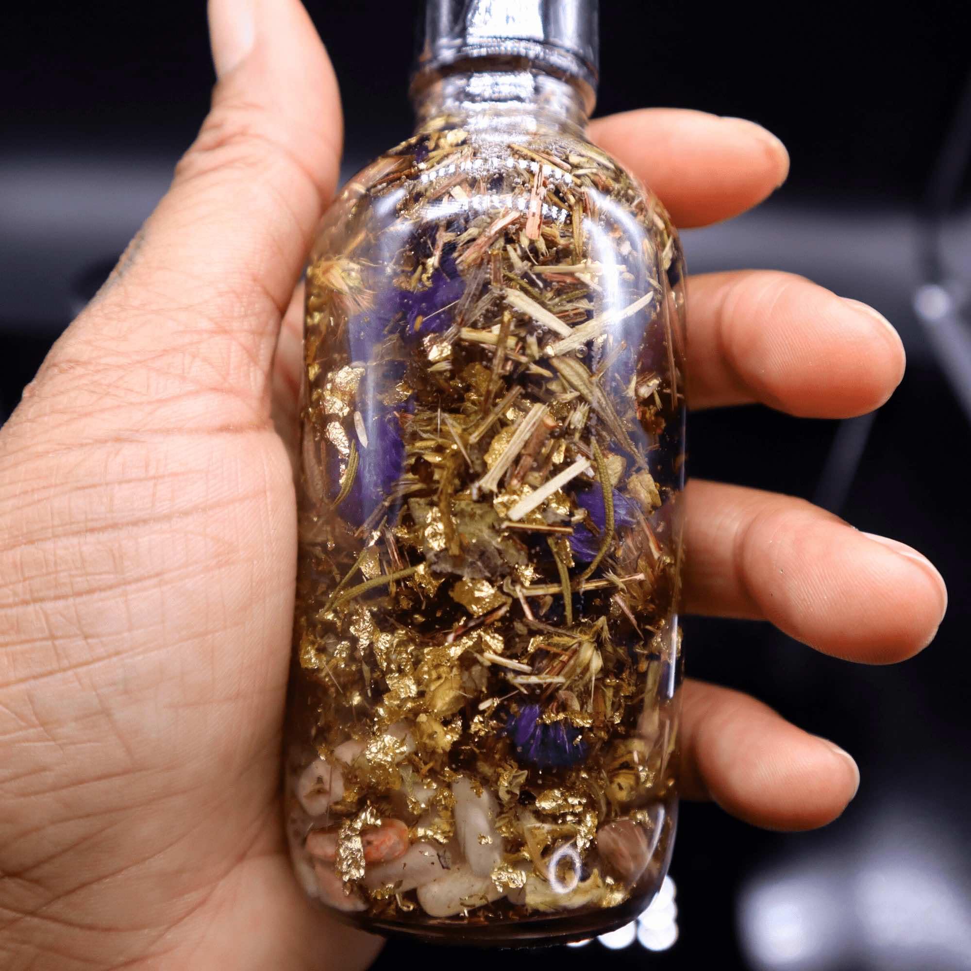 Vegan organic herbs and crystals in BlkGrlMagick oil