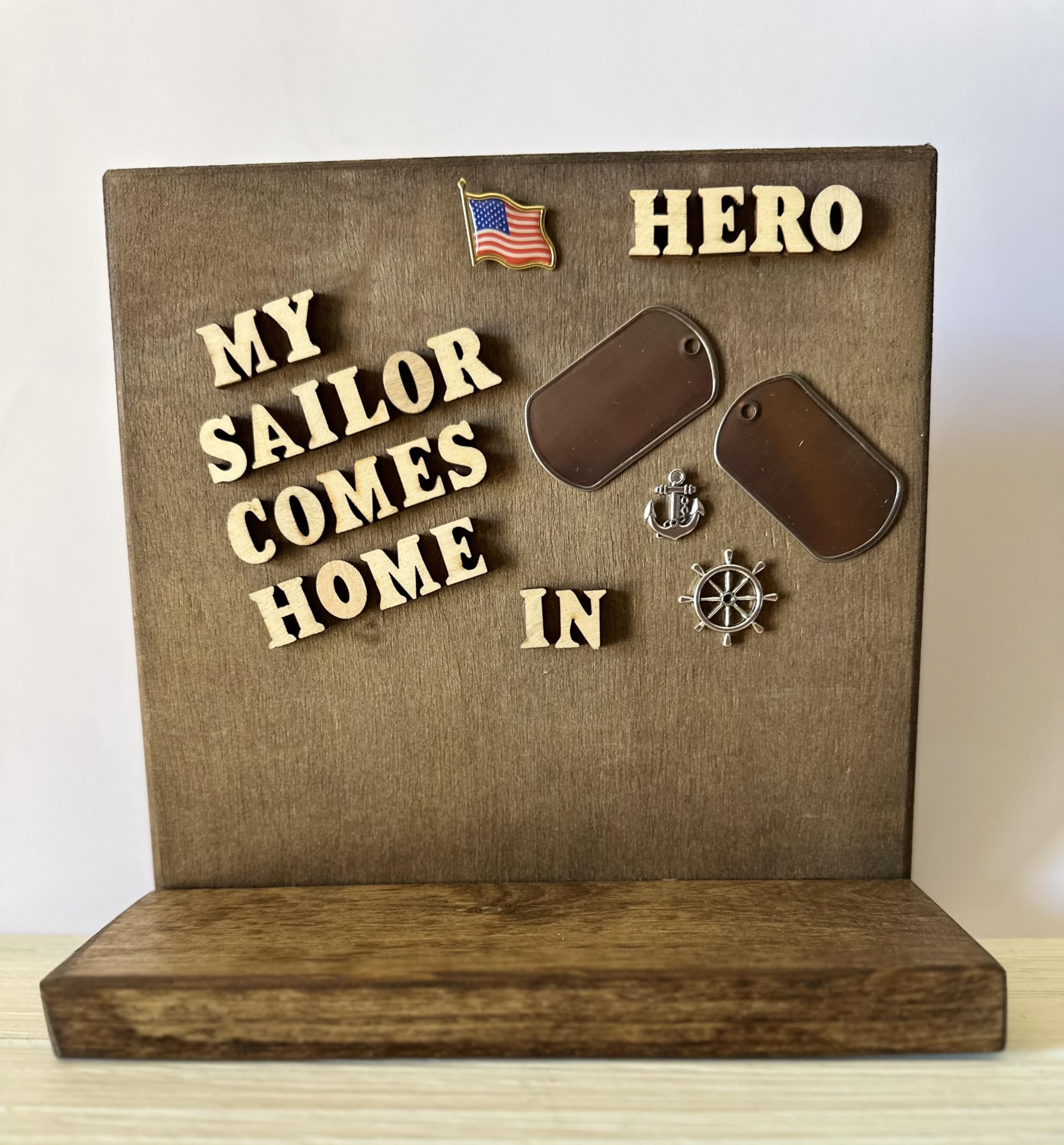 Natural color lettering reads My Sailor Comes Home In