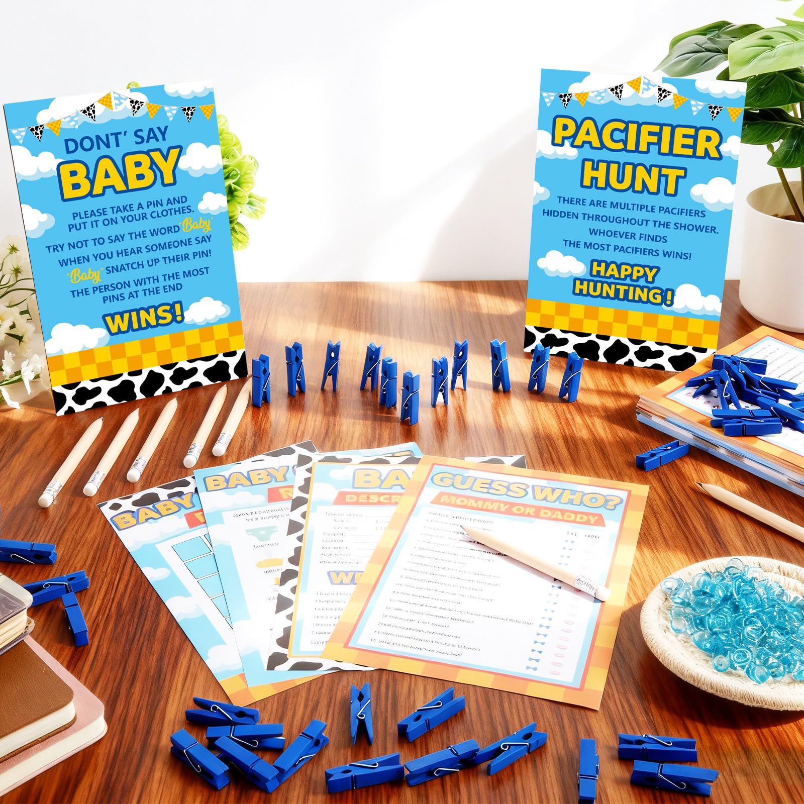 Blue acrylic pacifiers included in the set for games