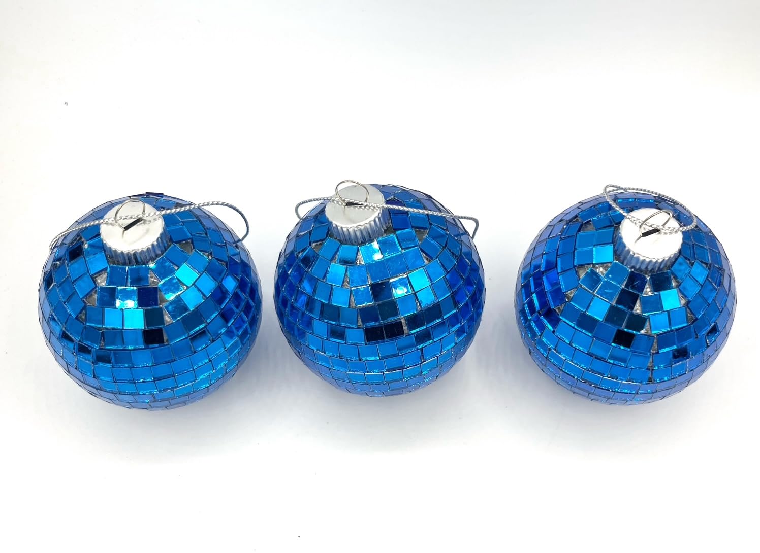 Blue mosaic tile ornament close-up with mirrored tiles