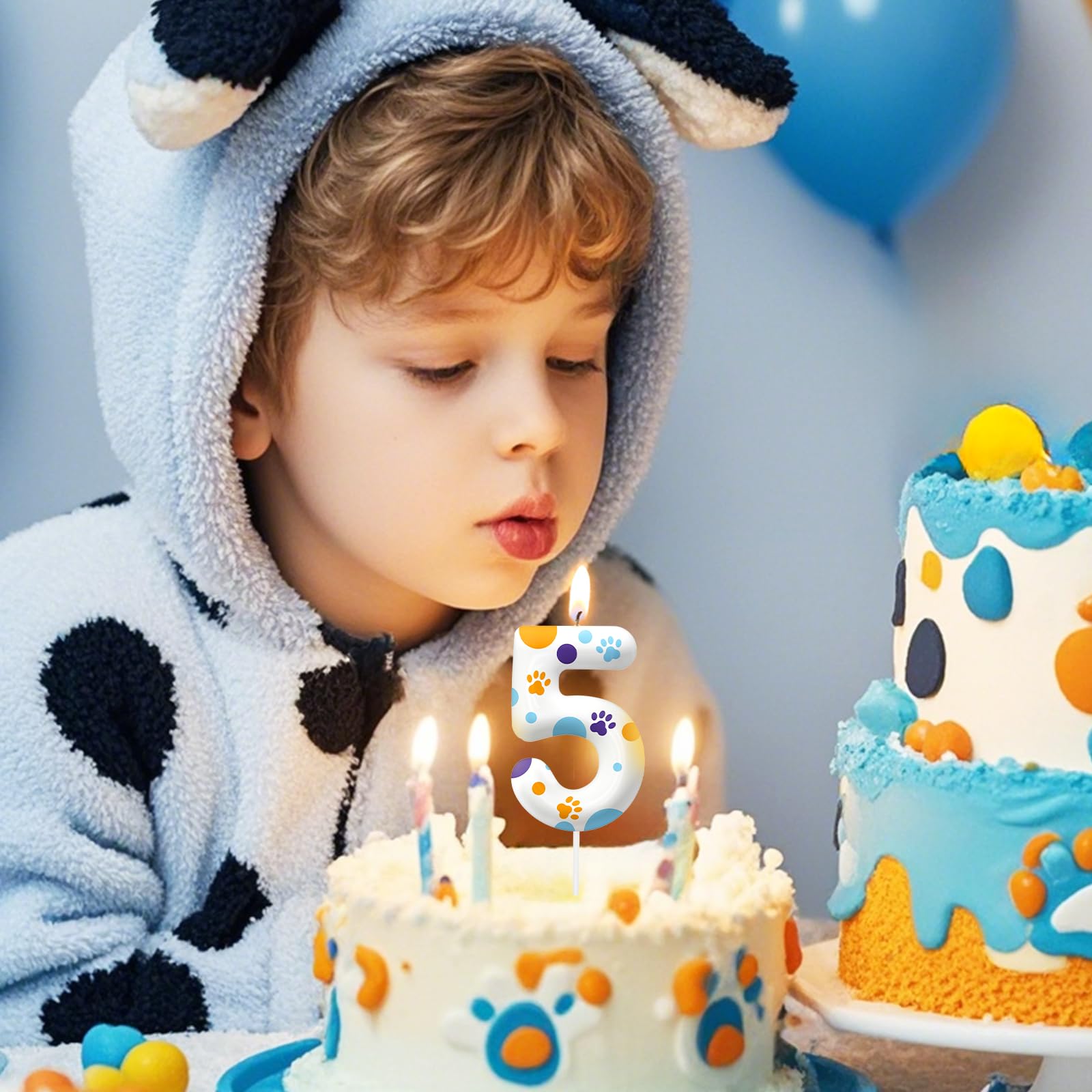 Blue dog paw print themed birthday candles for party supplies