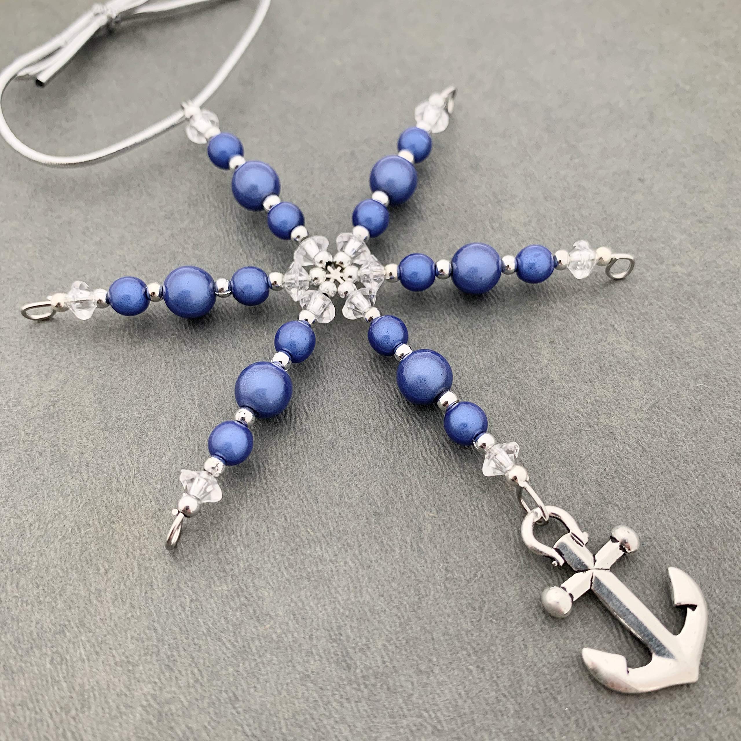 Blue miracle beads and vintage beads on hand beaded ornament