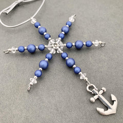 Blue miracle beads and vintage beads on hand beaded ornament