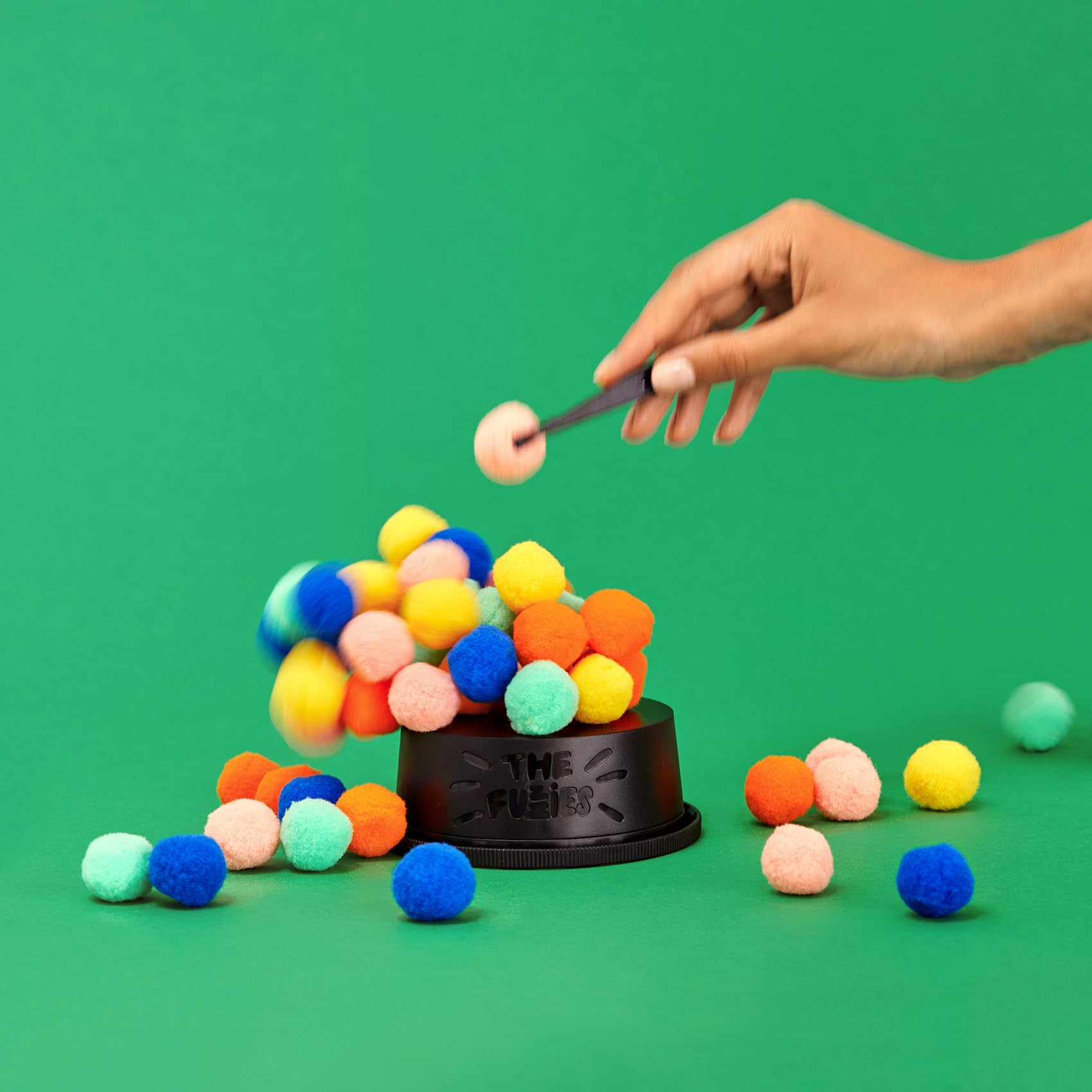 The Fuzzies Stacking Game packaging and components