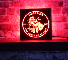 Skeleton couple LED sign in 12x12 solid wood frame