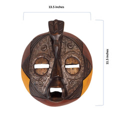 Artisan carved wood mask suitable for living room or hallway