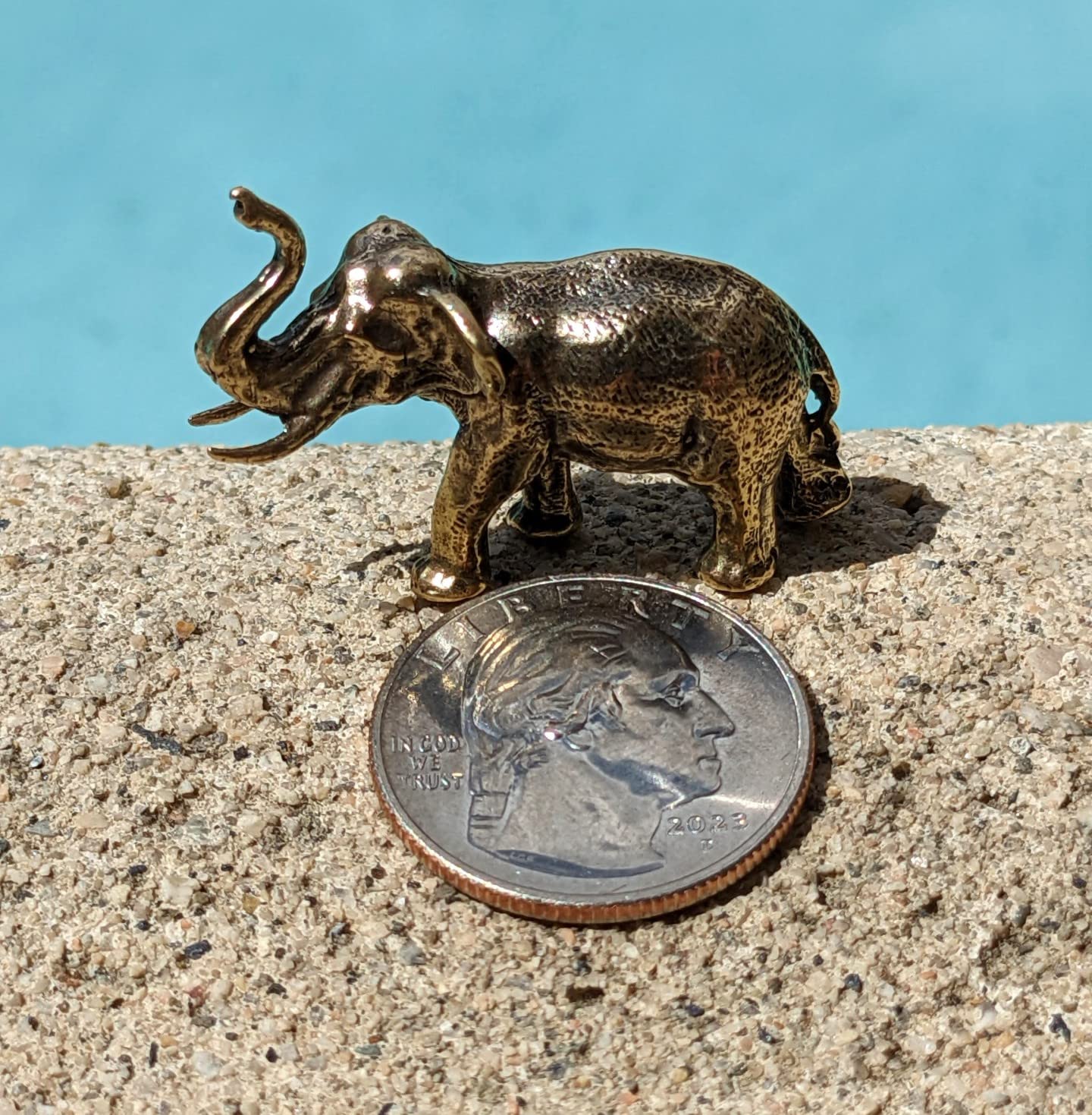 Brass elephant figurine ornament for fireplace mantel