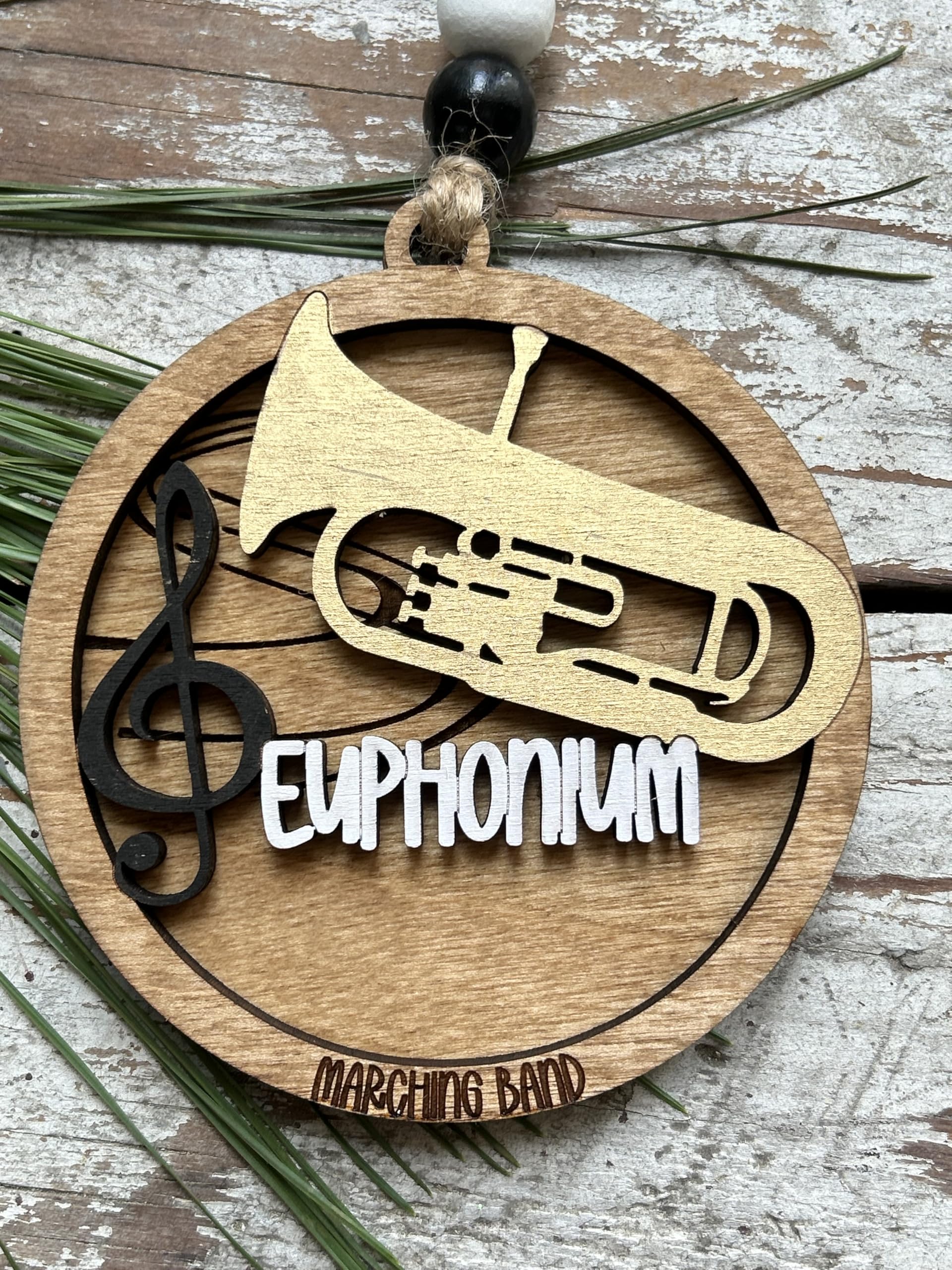 Handpainted wooden ornament crafted in North Carolina by a couple
