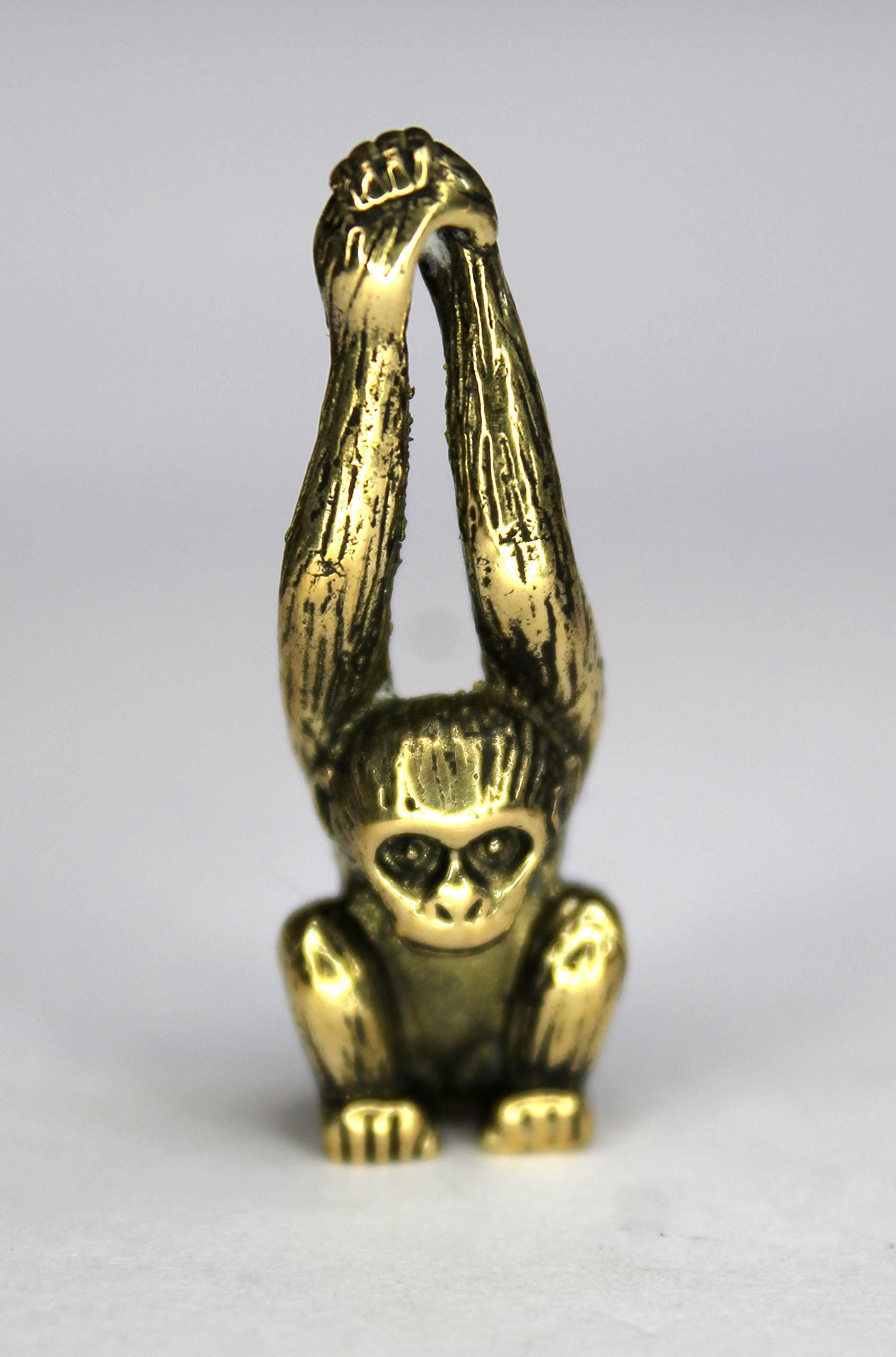 Brass monkey ornament for fireplace shelf decor