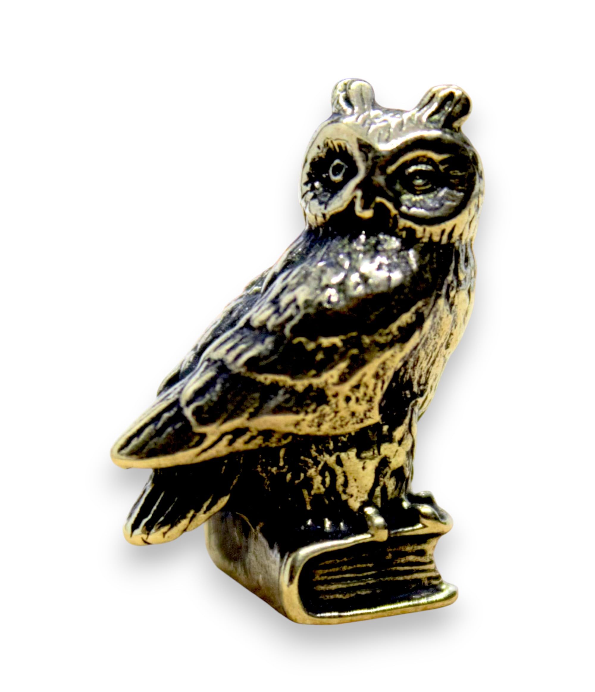 Brass owl figurine close up